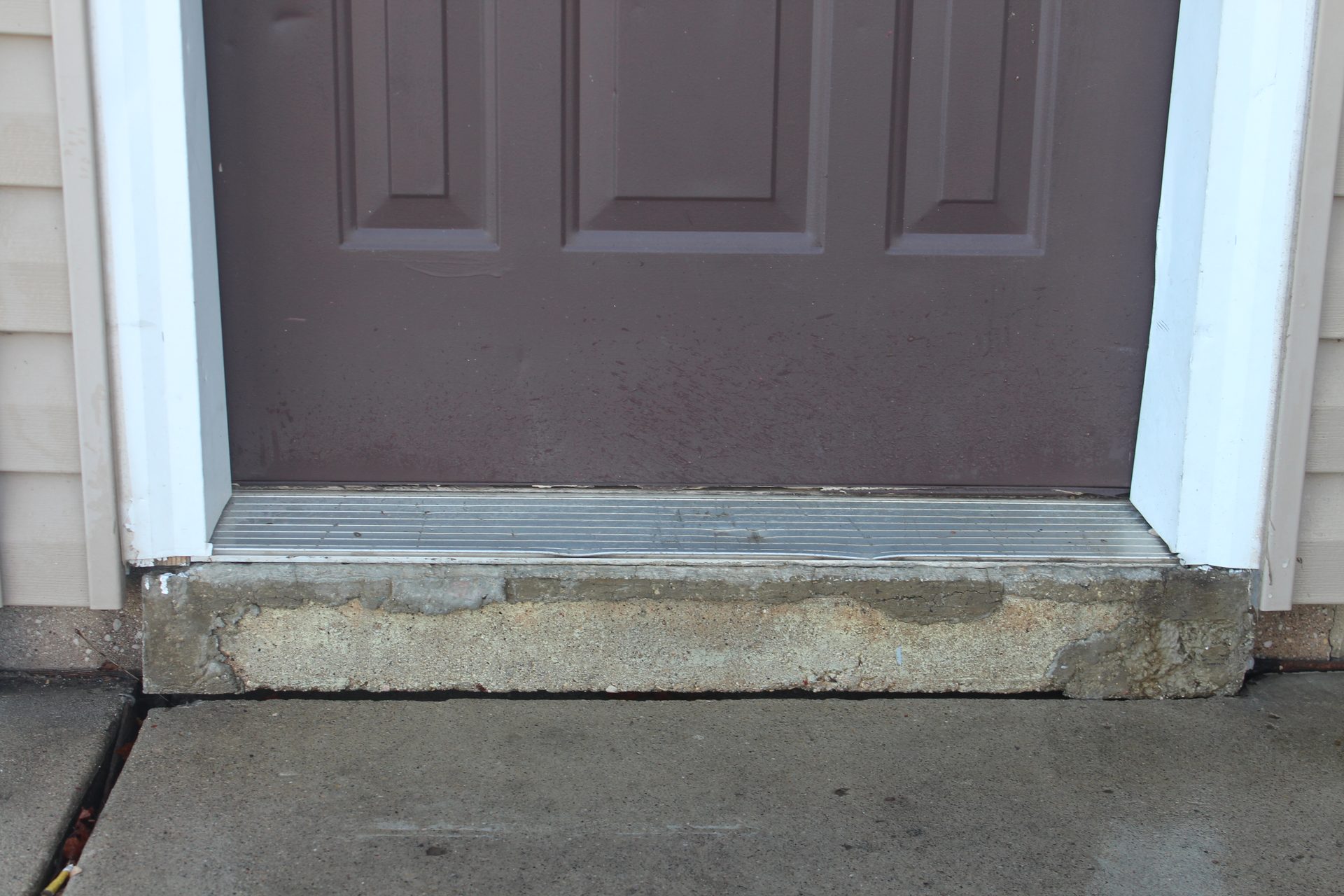 Concrete slab raised back to grade with polyurethane foam injection